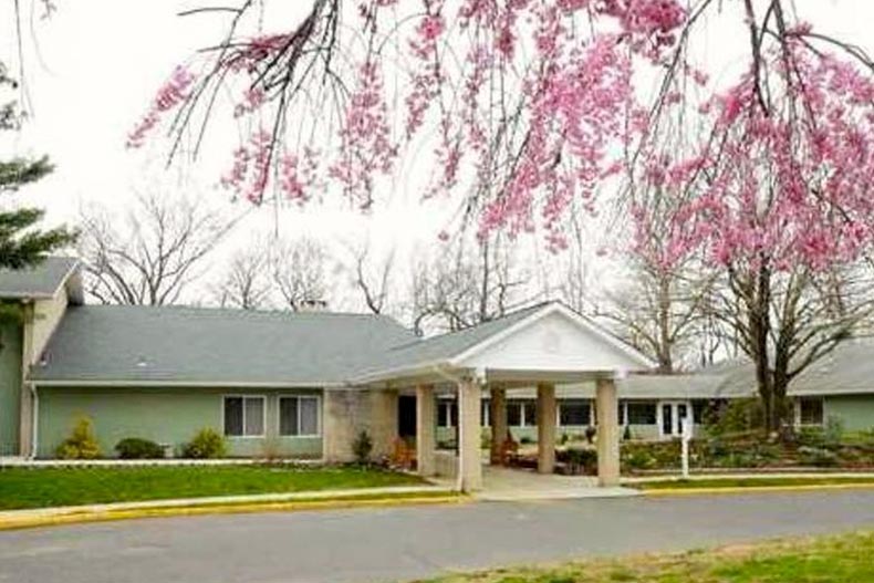 Exterior view of the clubhouse at Shadow Lake Village in Red Bank, New Jersey.