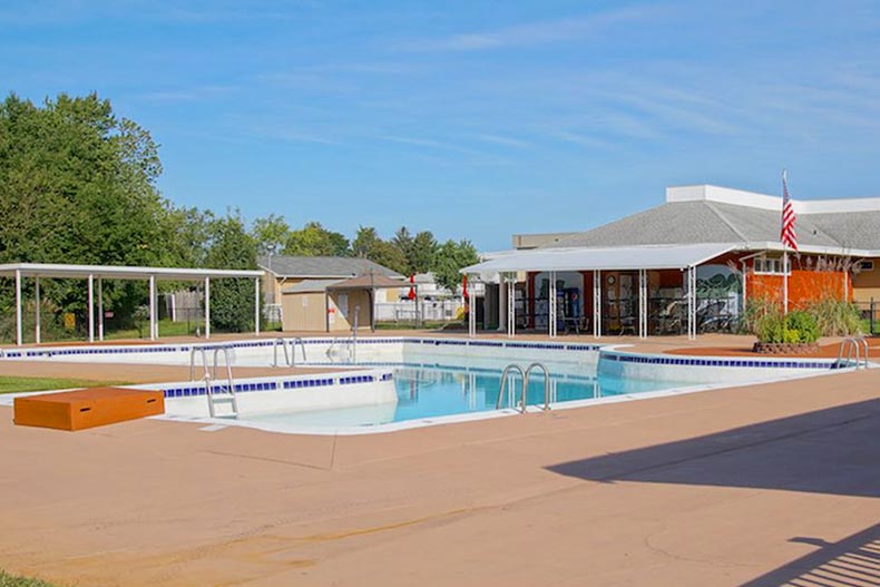 The outdoor pool at Holiday City at Berkeley in Toms River, New Jersey on a sunny day.