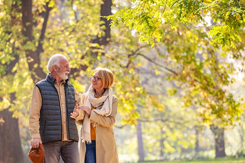 A retired couple taking a tour of a 55+ community.