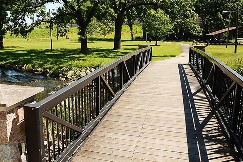 A bridge over a stream on the grounds of Andaré at Glenloch in Algonquin, Illinois.