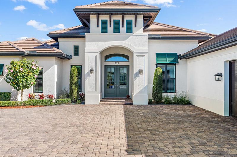 Exterior view of a community building on the grounds of Copperleaf in Palm City, Florida.