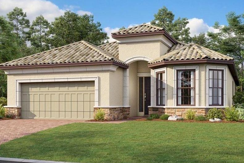 Exterior view of a home at Esplanade at Tradition, a community on the Treasure Coast of Florida with homes for sale.