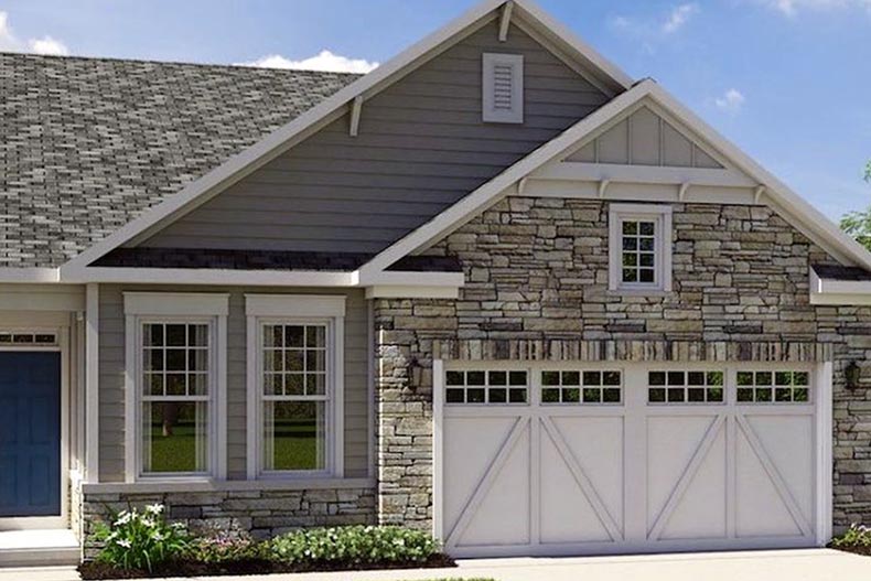 Exterior view of a house in Four Seasons at Monmouth Woods, one of many NJ 55+ communities.