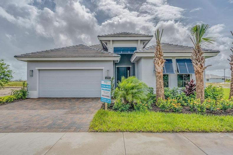 Exterior view of a home at LakePark at Tradition, a community on the Treasure Coast of Florida with homes for sale.