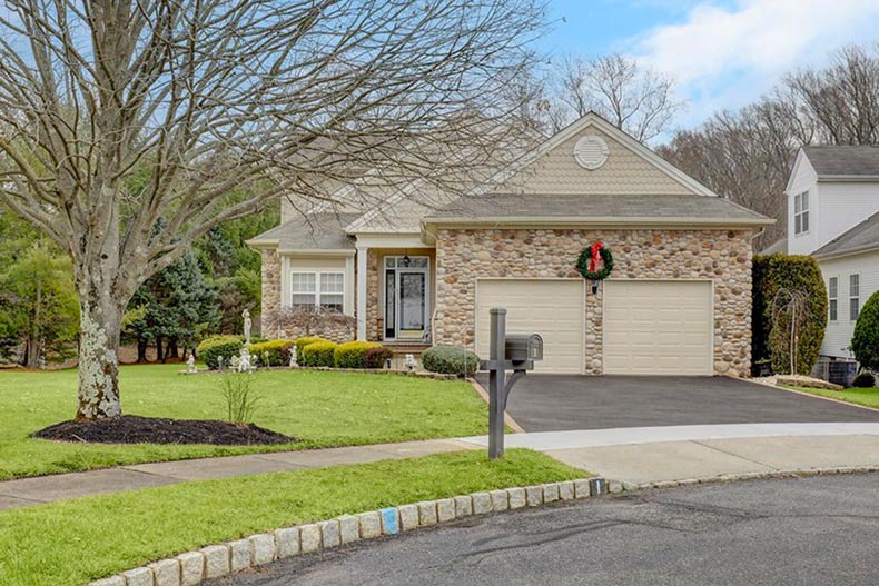 Exterior view of a house in Renaissance at Manalapan, one of many NJ 55+ communities.