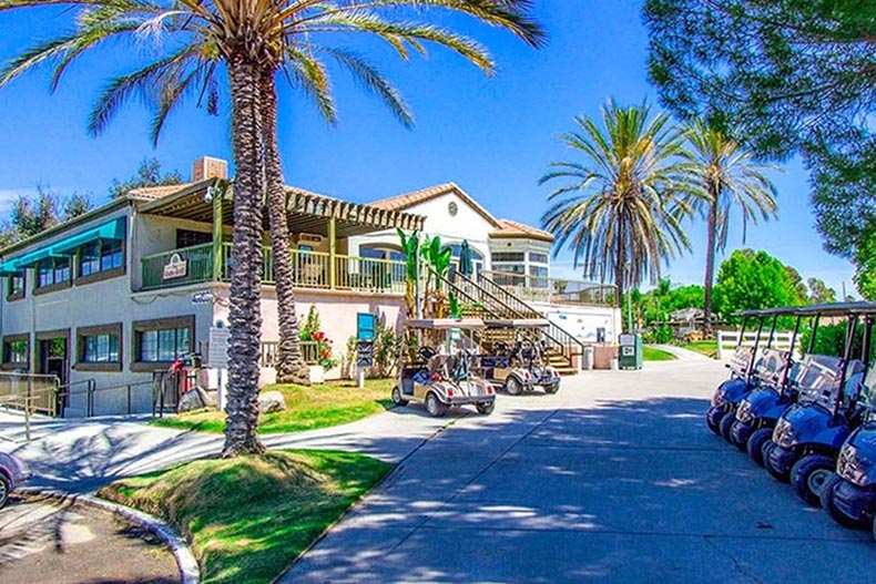 Golf carts at The Colony in Murrieta, California, a 55+ community offering access to Inland Empire golf courses.