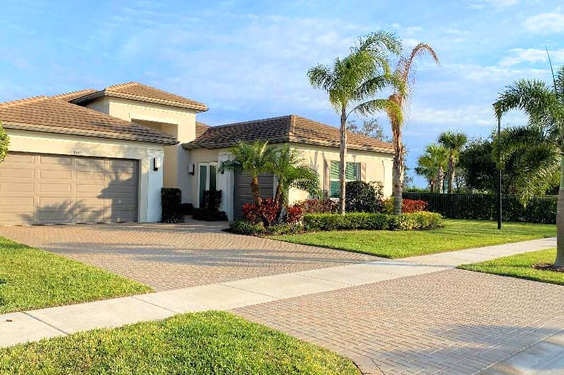 Exterior view of a home at Valencia Cay at Riverland in Port St. Lucie, Florida.
