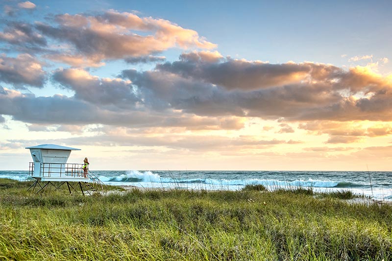 A Florida Treasure Coast beach at sunrise on a windy morning.