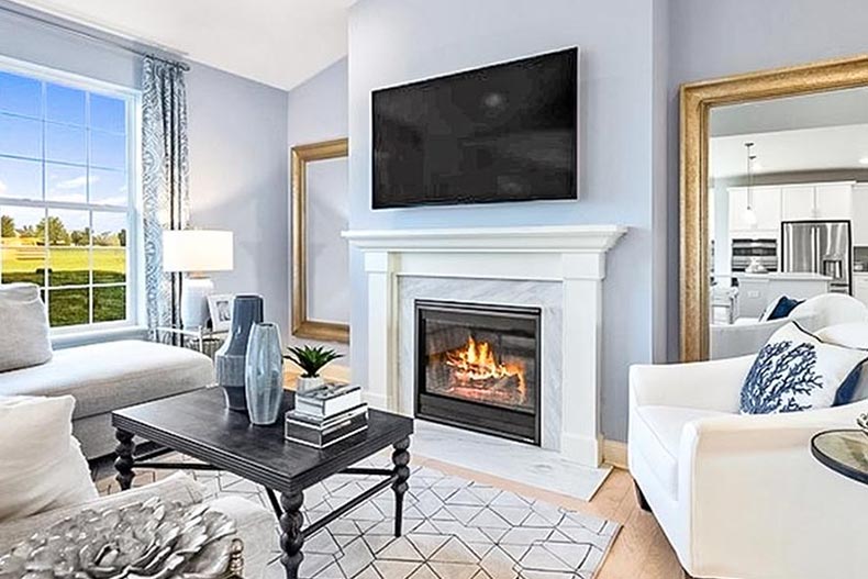 Interior view of a living room in a new construction home at Andaré at Woodlore Estates in Crystal Lake, Illinois.