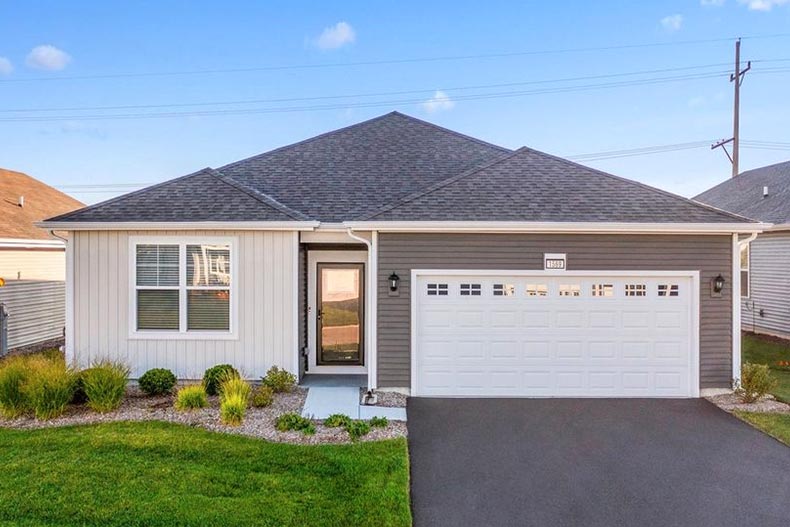 Exterior view of a new construction home at Carillon at Cambridge Lakes in Pingree Grove, Illinois.