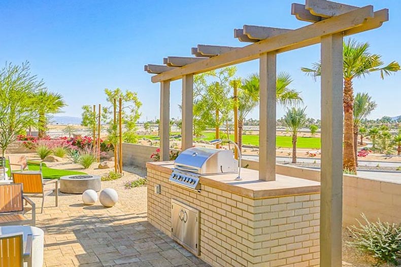 The outdoor patio and barbecue at Del Webb Rancho Mirage in Rancho Mirage, California.