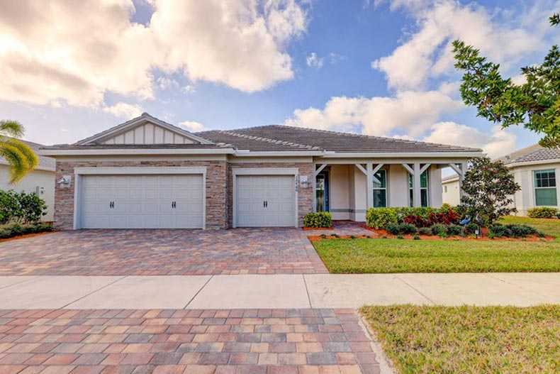 Exterior view of a home in Del Webb Tradition, one of many affordable 55+ pet-friendly communities in Florida.