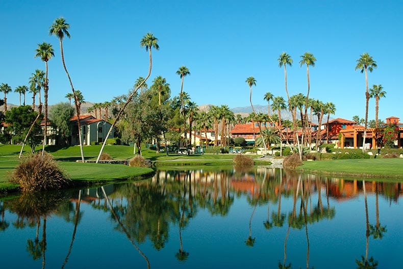 View across a pond of a resort in Palm Springs.