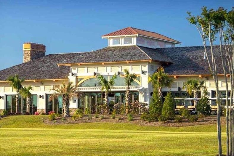 Exterior view of a community building at Compass Pointe in Leland, North Carolina.