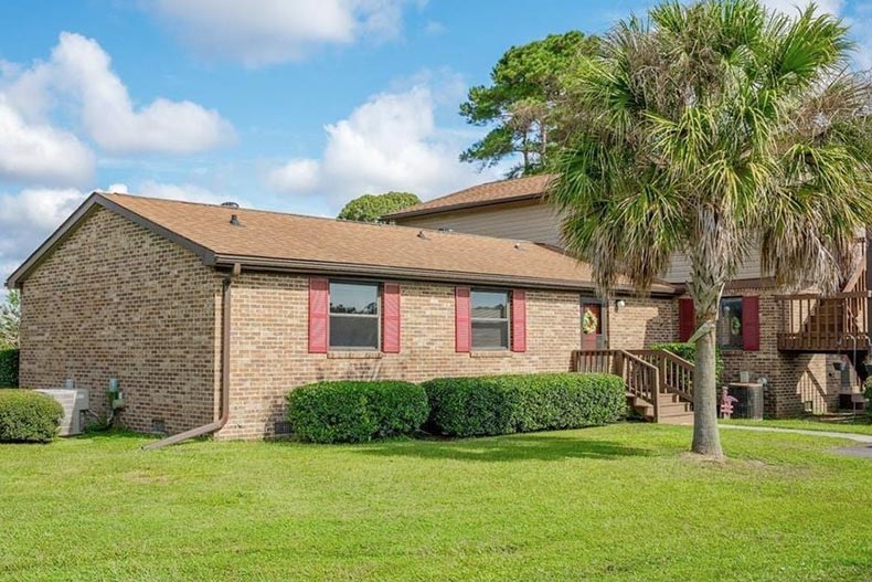 Exterior view of a community building on the grounds of Island Green in Myrtle Beach, South Carolina.