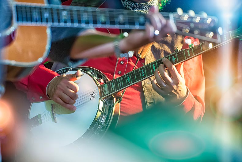 Close up of a banjo player in a country band in Nashville, Tennessee.