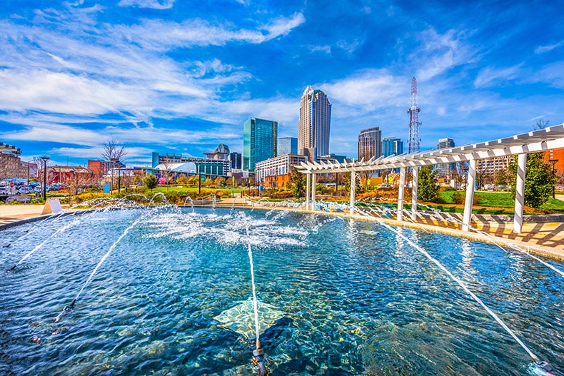 The skyline and First Ward Park Fountain in Charlotte, North Carolina.