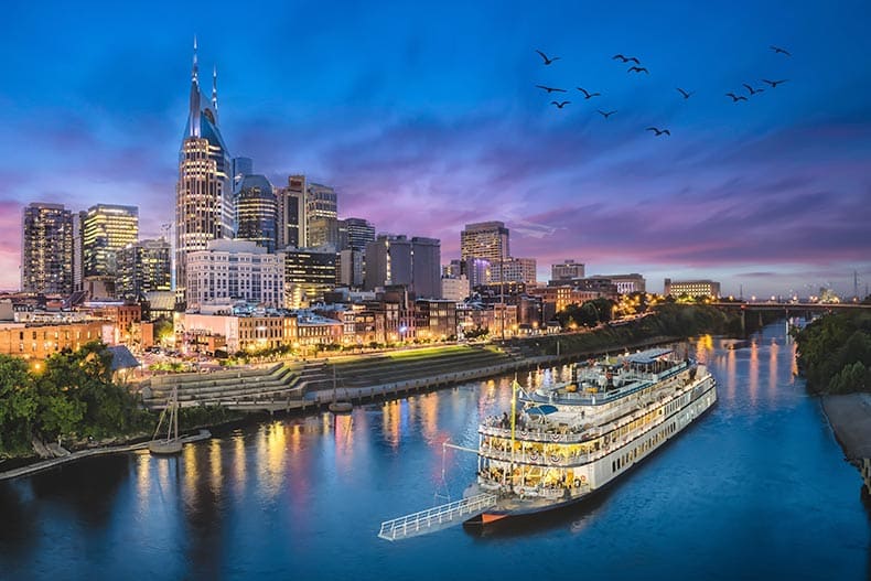 The Nashville skyline and river at sunset.