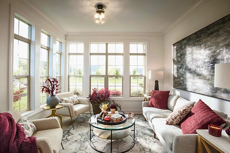 Interior view of a living room in a model home at The Courtyards at Bailey Farms in Dacula, Georgia.