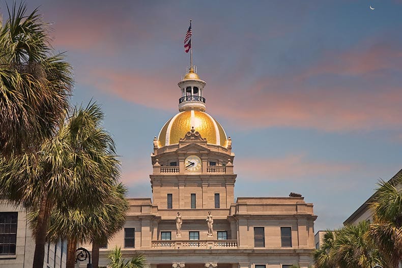 The famous gold domed city hall, an iconic landmark for homebuyers moving to Savannah, GA.