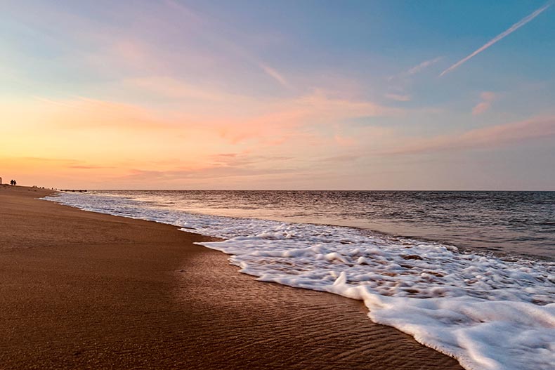 Rehoboth Beach in Delaware at sunset.