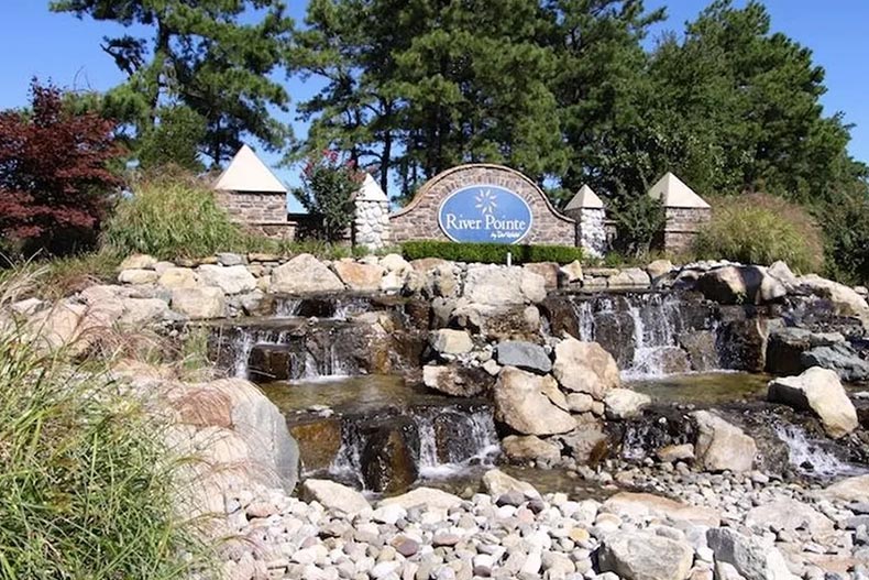 A water feature beside the community sign for River Pointe in Manchester, New Jersey.