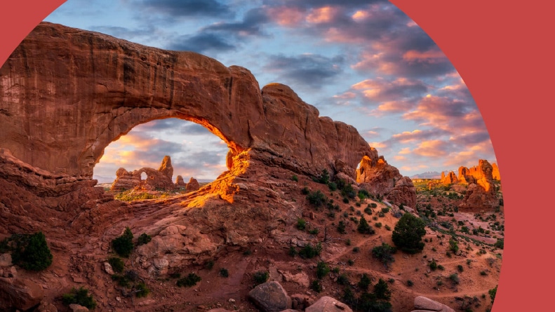 Evening light over North Window with Turret Arch in the distance at Arches National Park, Utah.