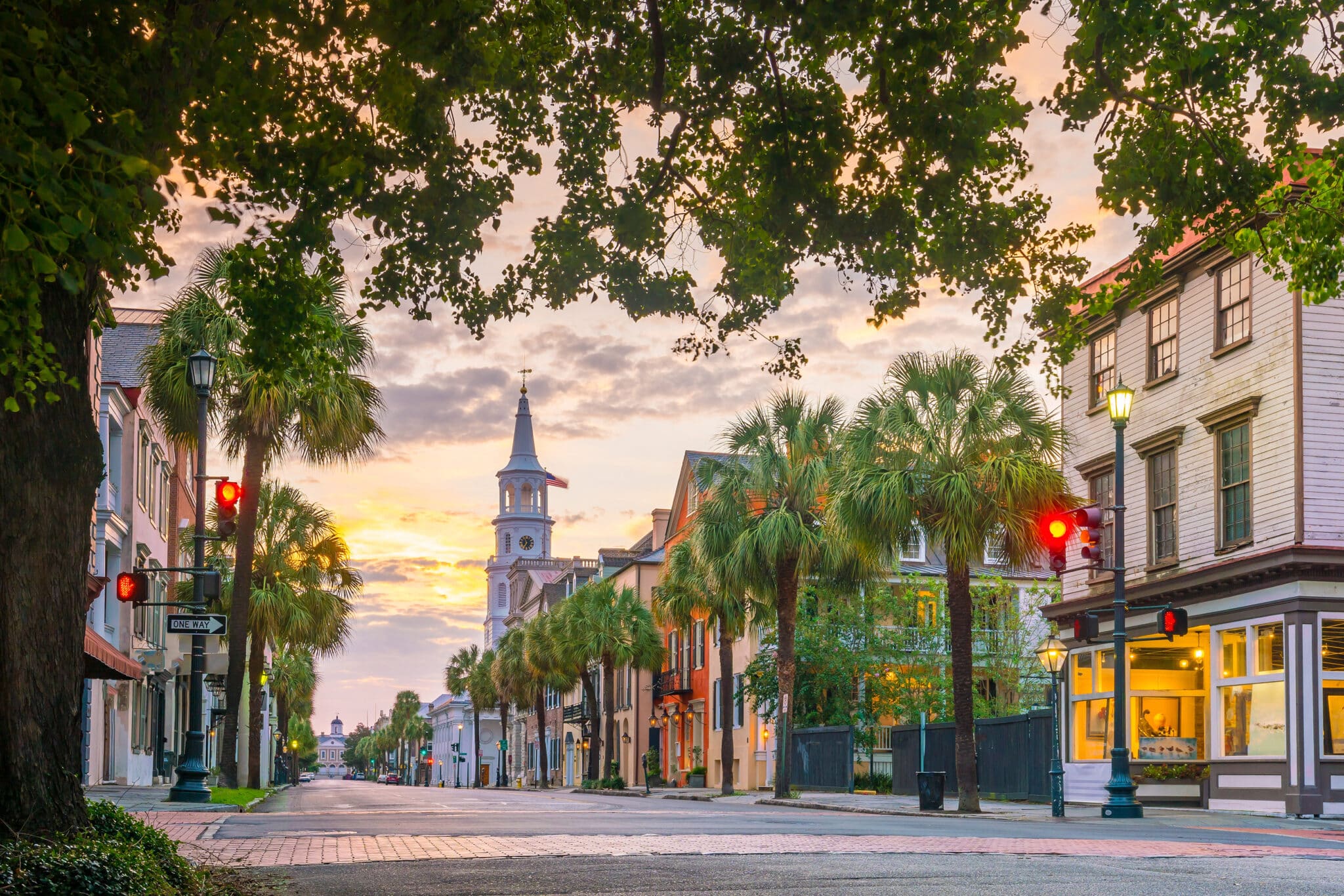 Sunset view of a downtown street in Charleston, South Carolina.