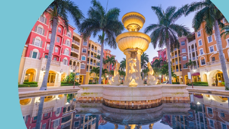 The town skyline and city plaza at twilight in Naples, Florida.