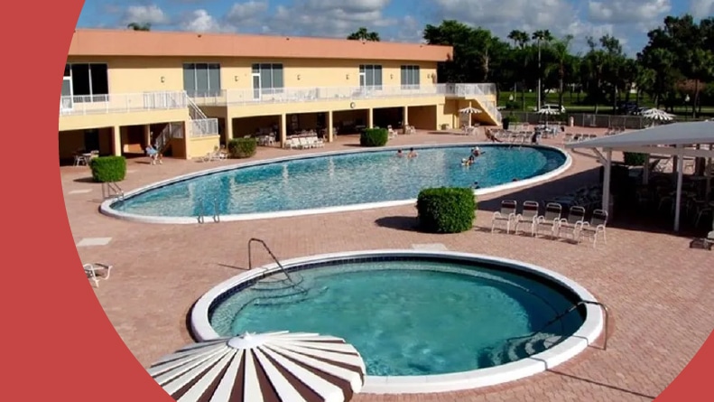 The outdoor pool and whirlpool spa at Lakes of Delray in Delray Beach, Florida.