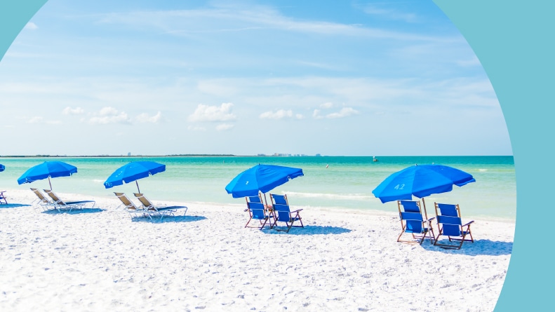 Lounge chairs on a beach in the Tampa Bay area.