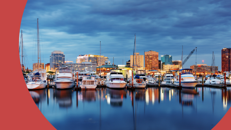 Boats docked in Chesapeake Bay at twilight in Norfolk, Virginia.
