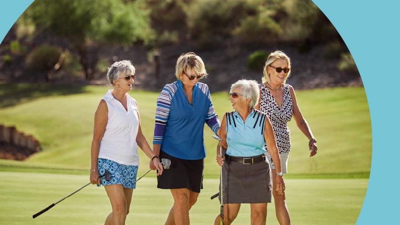 A group of female friends playing golf in their 55+ community.