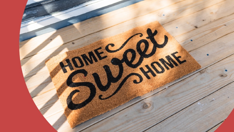 A "Home Sweet Home" welcome mat outside of a house in a 55+ community.