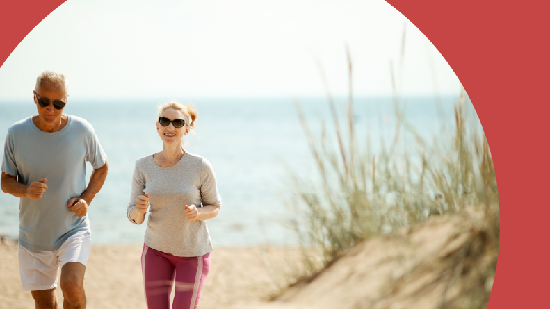 Retired spouses jogging in the morning on the beach.