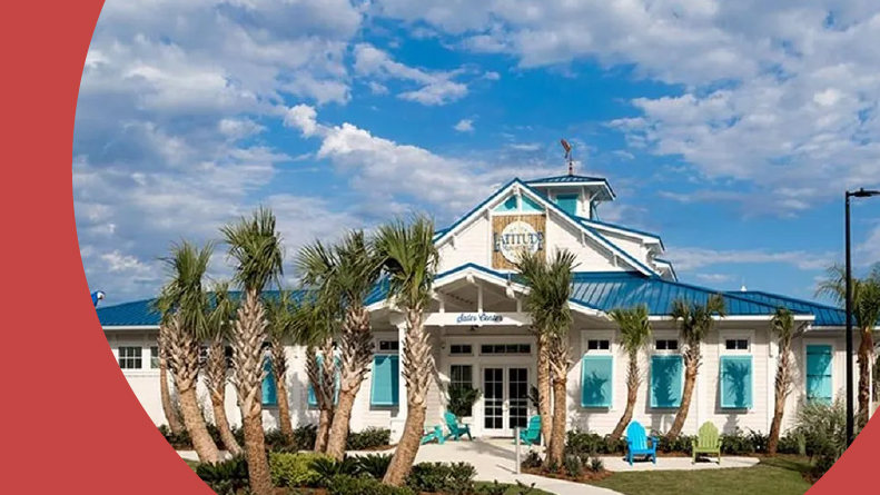 Palm trees outside the clubhouse at Latitude Margaritaville Watersound in Panama City Beach, Florida.