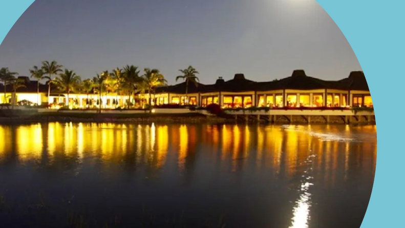 View across the water of the amenities at Pelican Bay in Naples, Florida.