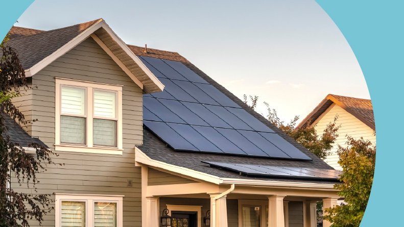 Solar photovoltaic panels on a house roof.