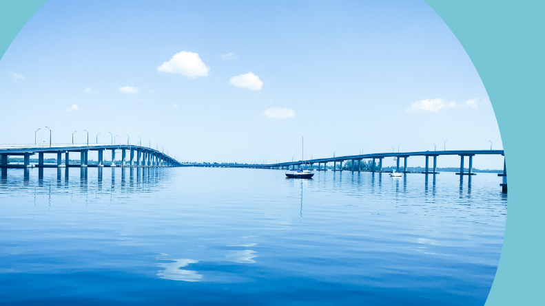 View across the water of the Fort Myers bridge from Cape Coral, Florida.
