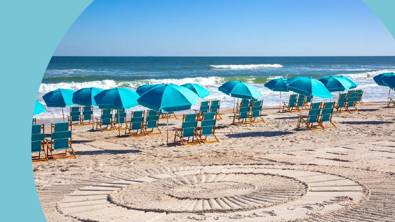 Lounge chairs and umbrellas on the private beach at Latitude Margaritaville in Daytona Beach, Florida.