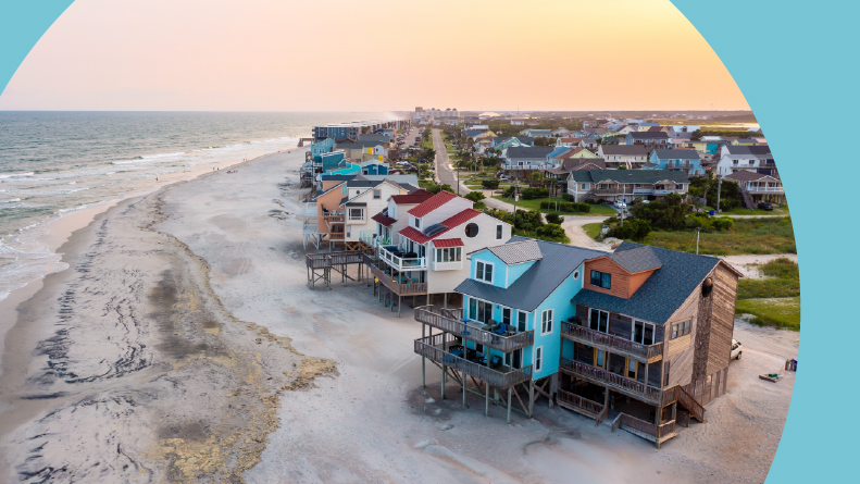 Aerial view of beach homes along the coast on North Topsail Beach Island in North Carolina.
