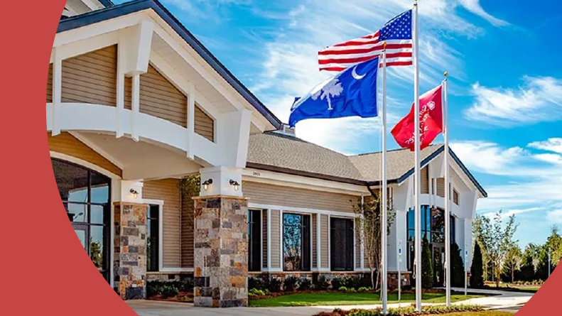 Flags outside the clubhouse at Sun City Carolina Lakes in Indian Land, South Carolina.