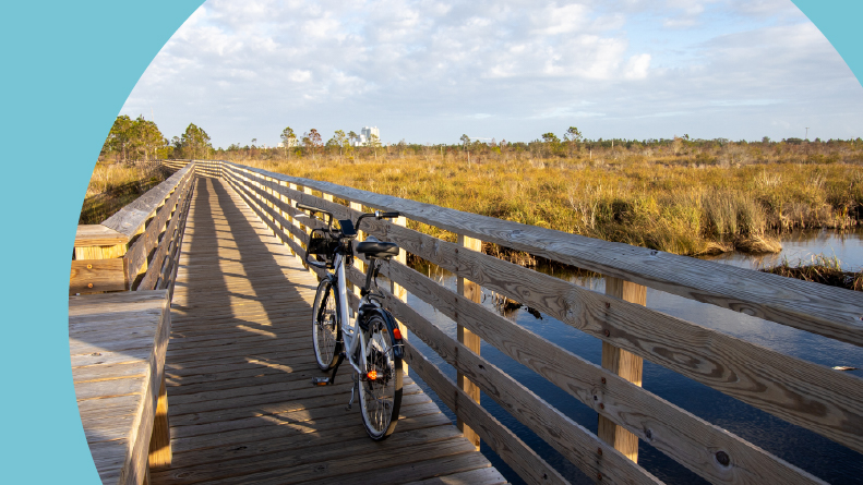 A bike on a boardwalk at Shelby Lakes in Gulf State Park.