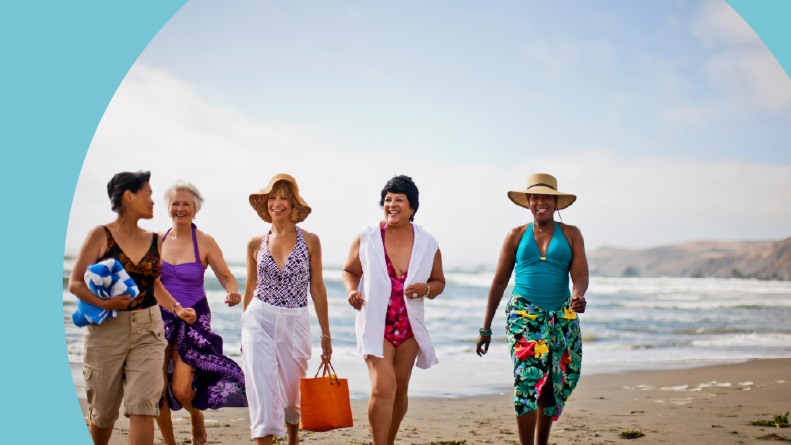 Happy friends of retirement age in Florida enjoying a day at the beach.