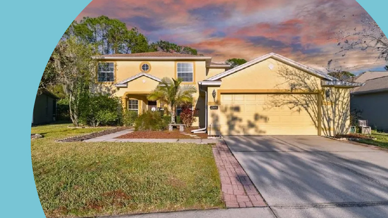 Exterior view of a model home at Carillon Lakes.