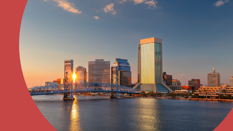 Reflection of the skyline in the water at sunset in Jacksonville, Florida.