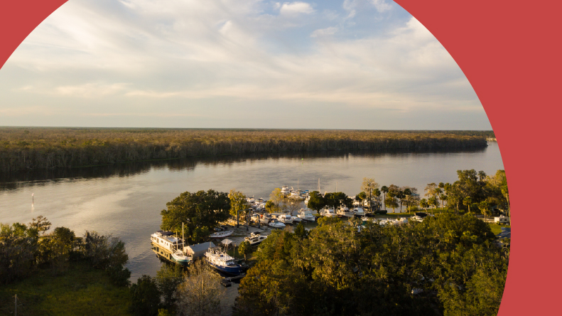 Aerial view of Ocala National Forest and St. Johns River at sunset.