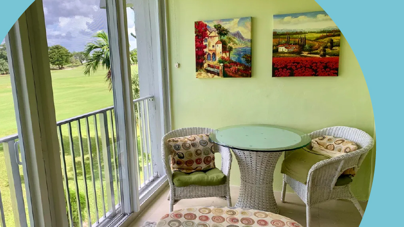 Interior view of an enclosed balcony in a condo at Oriole Golf & Tennis Club, one of many 55+ communities in Florida with low HOA fees.