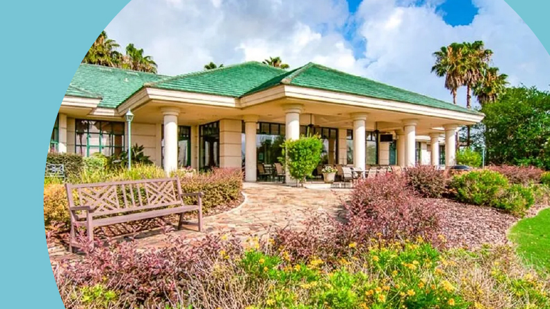 Exterior view of the clubhouse at Spruce Creek Country Club in Summerfield, Florida,
