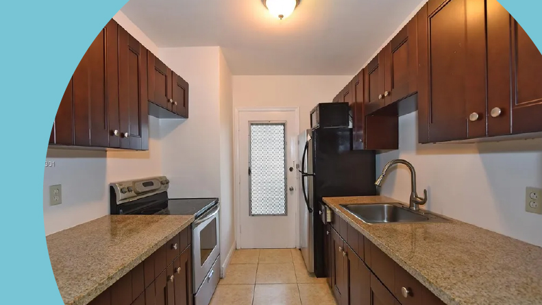 Interior view of a kitchen in a condo at Star Lake Estates, one of many 55+ communities in Florida with low HOA fees.